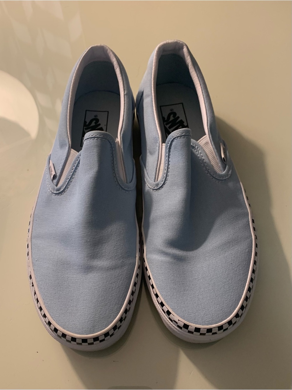 Vans Light Blue Slip-On Sneakers with Black & White Checker Trim